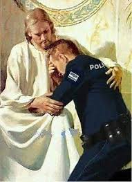 Jesus hugging police